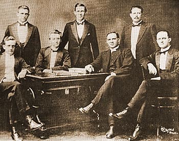 South African Broederbond Members and leadership in 1918. From left to right: D.H.C. du Plessies, J. Combrink. H. Le R. Jooste. Seated: L.J. Erasmus, H.J. Klopper, Ds W. Nicol, J.E. Reeler