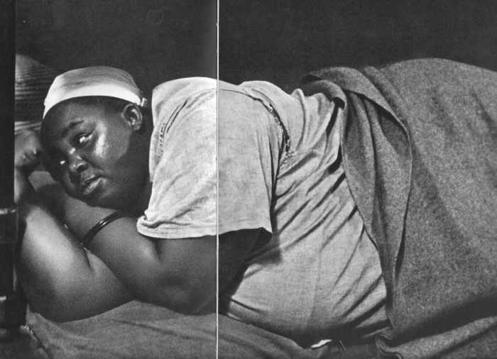 Maternity Ward in South AFrica and due to a shortage of beds, a pregnant woman about to give birth lying on the floor. Botha was right, they were not paying people to bring Black children into the world.