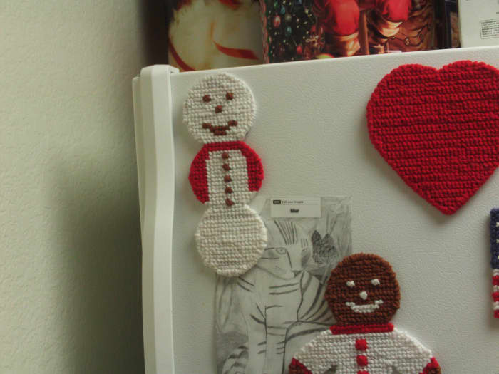 My snowman looks super surrounded by my other cross stitched magnet. As I said, my cross stitched magnet making is becoming somewhat of an amusing addiction.