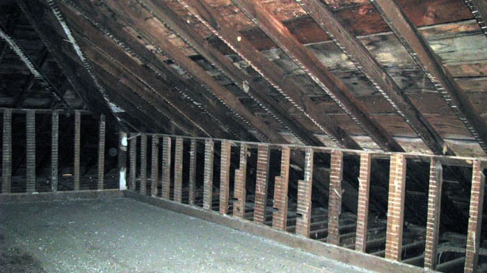 Second photograph taken in the attic. Two orbs in this one too... This area was located on the right side of where we were standing. The first was taken straight on from the top of the stairway back into the room.