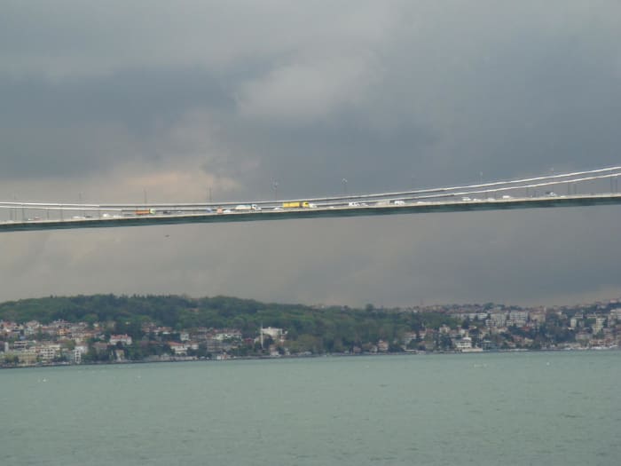 Not the best photo from Istanbul, but it perfectly depicts what this city is about: Europe and Asia meet through tended bridges, both physical and metaphorical. This is the Easternmost, longest bridge over the Bosphorus, Fatih Sultan Mehmet Bridge