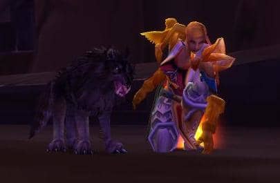 This picture was well cropped. It is my first character at lvl 60 in Hellfire Ramparts. The position was created by looting a nearby body. The pet is a Worg Pup.
