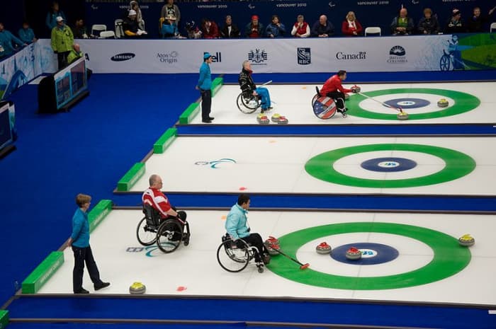 In Vancouver in 2010, United States competes against Sweden for the Bronze. Below, South Korea competes against Canada for the Gold.