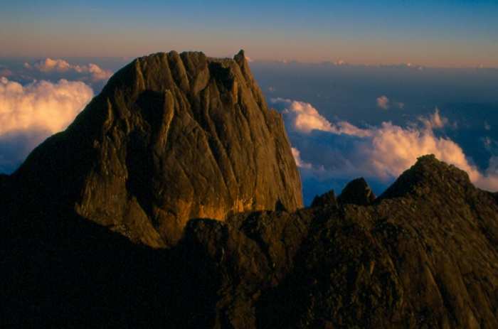 Victoria Peak (13,431') from Lows Peak (13,455') at first light. Gunung Kinabalu National Park, Malaysia.