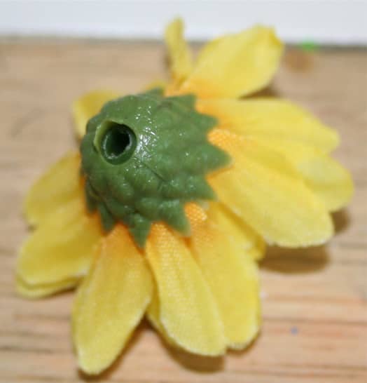 This is the back of one of the small flowers I've used. In this photo, I've already removed the wire stem.