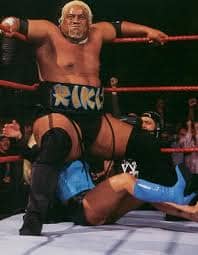 Rikishi executes the stink face like a confused frat boy trying to daterape a poor passerby with their butt!