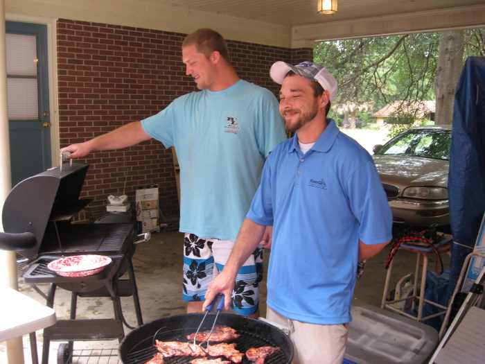 Dueling charcoal grills, starring Cory and Justin. Can you hear the theme of Deliverance playing in the background?