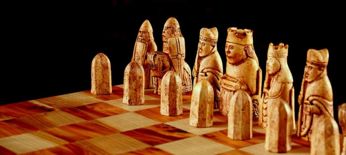 The Lewis chess set - one of the pawns is portrayed as a 'berserker', chewing the top of his shield in a frenzy. The Norsemen would have learned about chess from their travels to the near east.