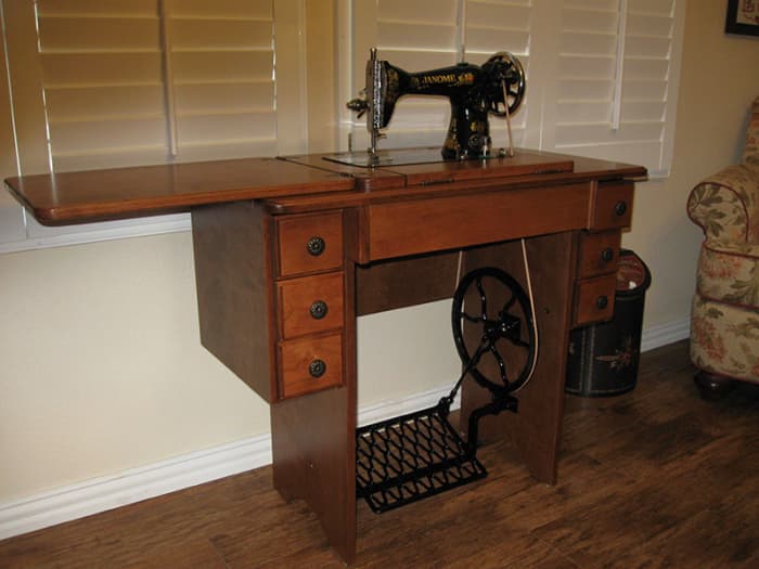 Many are keeping an original treadle machine in the sewing room along with an electric machine. This is a reproduction cabinet from Cottage Craft Works.