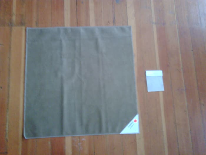 Here is the large fabric swatch compared to the small sized swatch - not the same colors, but gives you an idea of size