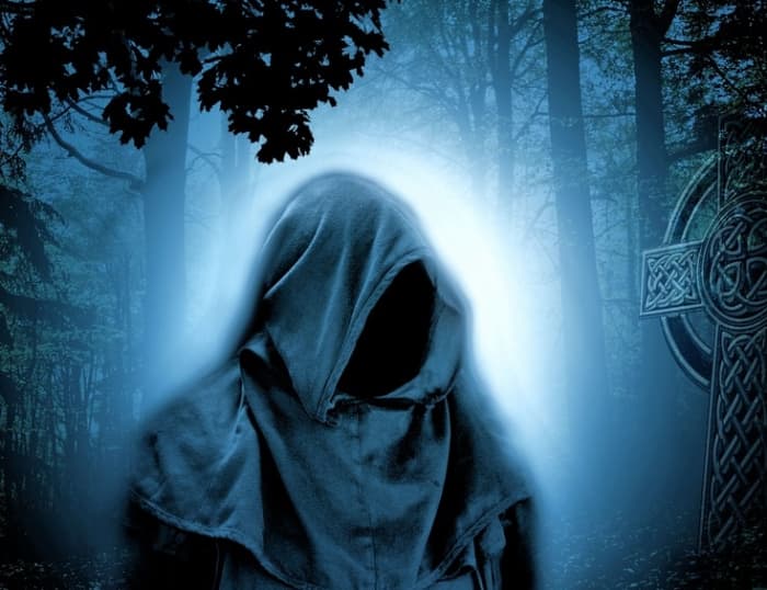 A depiction of a dark sorcerer. A black arts magician is no different than other kinds, visually speaking; however, there is a group mentality, and dark sorcerers tend to appreciate all things dark, such as this image