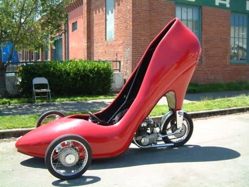 This giant shoe art car really drives but is not street-legal and thus goes to shows in a trailer.