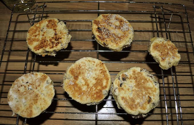 When cooked place your Welsh cakes on a cooling rack. While they're still hot, sprinkle them with sugar.