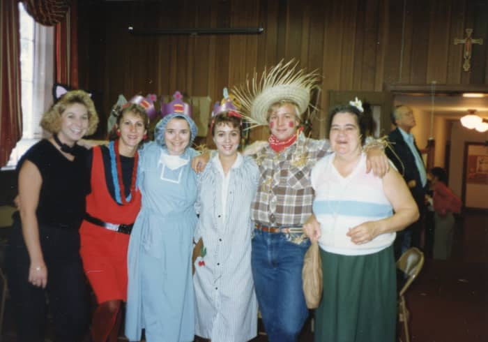 Elizabeth in cat costume, Marsha as punker, me in scrubs, Cathy as domestic goddess and Mike as scarecrow.