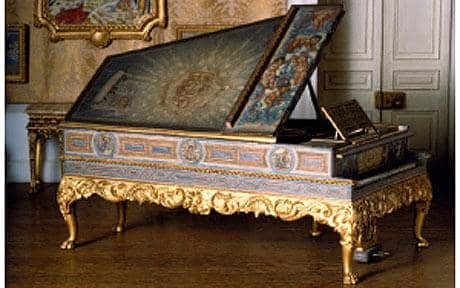 This exquisite decorative grand piano is just one of many beautiful objects to be found within the dollhouse.