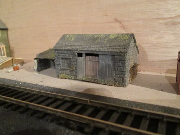 The modified Wills' forge kit with lean-to shed (left) from their 'grotty huts and privy' kit... These structures will be used on the 'Ainthorpe Junction' layout in my cellar