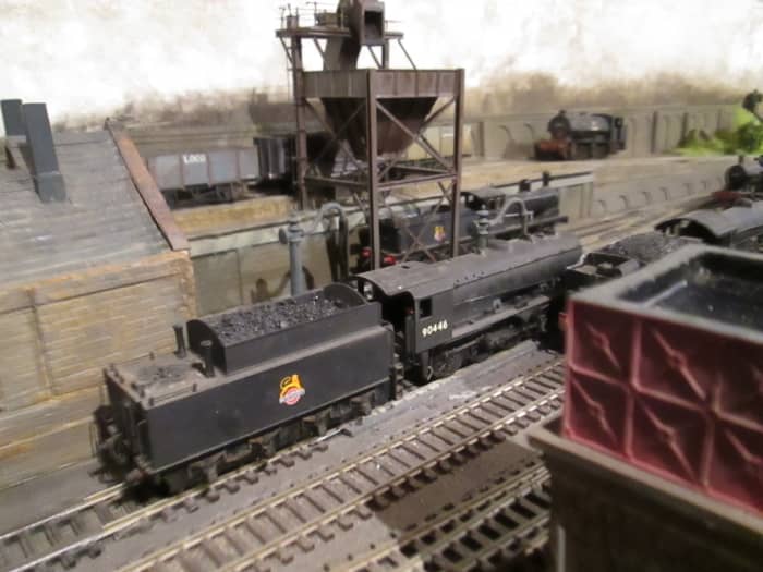 Ayton Lane's coaling tower kit needed modifications to fit in its location. Right foreground: Hornby 'Skaledale' water tower based on Goathland; left is entry to scratch-built two-road loco shed, Mike's Models water cranes; track now cinder-ballasted