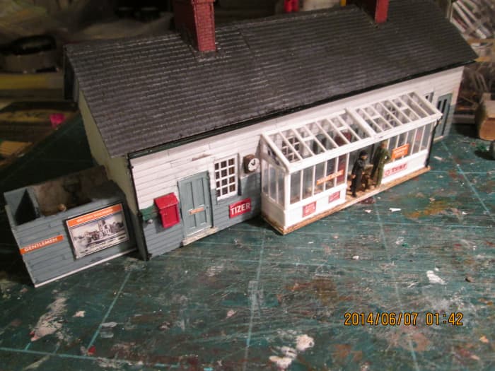 The station building, gents at the end. At left is staff/porters room, ladies' room, booking office and general waiting room far right