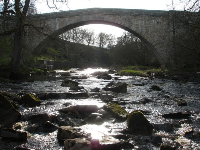 Rutherford Bridge, on the River Greta in Co. Durham. Photo by Andy Waddington sourced through Wiki Commons