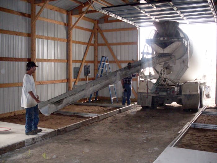 They see how the chute sections are put in place, and how the truck is backed toward the far interior of the building. They know that a good truck driver is worth a lot, and have seen the messy results of some poor ones.