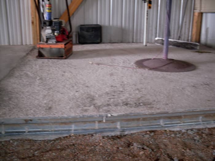 This machine helps compact and settle the dirt, so air pockets don't cause problems during or after the pouring of the concrete.
