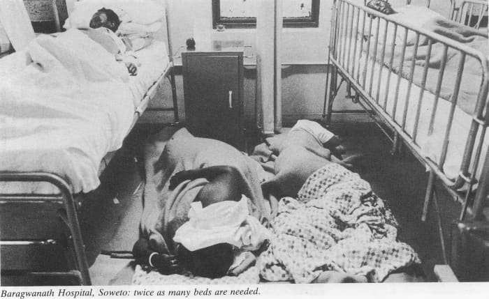 Overcrowded ward in Baragwanath (Chris Hani) Hospital with patients sleeping on the floor during the Apartheid era