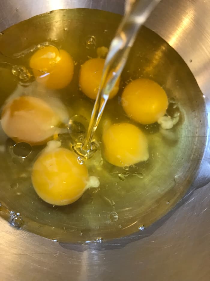 Mix together the eggs, pumpkin, oil and sugar in the bowl of an electric mixer, and beat until smooth. Pick a big bowl - you'll need the room!