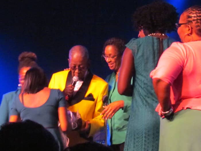 Blue Lovett, is joined on stage by his family, who thanked him for his love and support over the years.