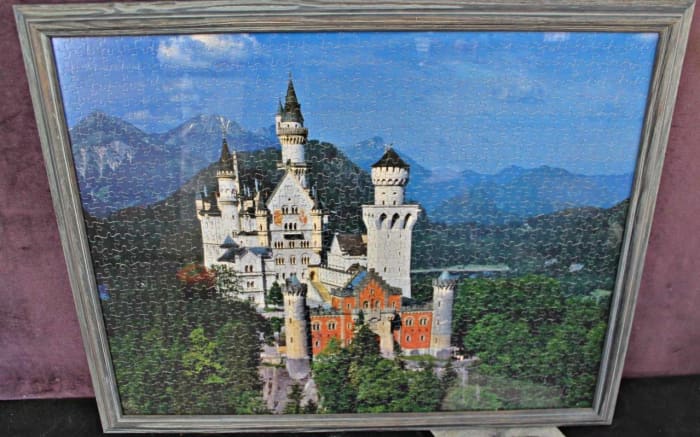 Beautiful framed 24 inches by 30 inches Ravensburger Jigsaw puzzle of Neuschanstein Castle in Germany