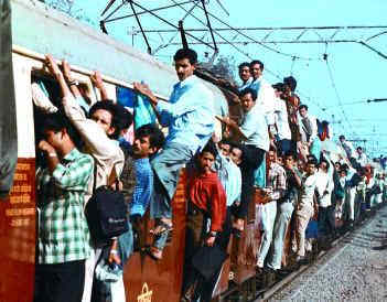 People hanging with this local train in MUMBAI are not trying to attempt a Guinness world record, It is part of their daily life.
