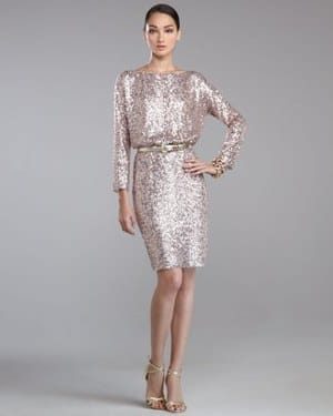 Sequined knit. Bateau neckline. Dropped shoulders. Bracelet sleeves. Blouson bodice. Pencil skirt. Hem hits above the knee. Polyester. Imported.