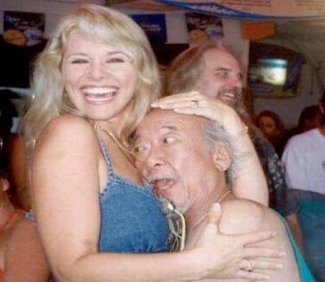 This old man with sexy blonde has thrown away his credit cards. Look how happy he is after getting out of debts.