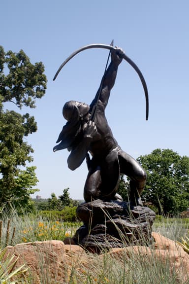 Museums in Tulsa: "Sacred Rain Arrow," a 1998 bronze sculpture by Allan Houser (Chiricahua Apache), at the Gilcrease Museum in Tulsa, Oklahoma