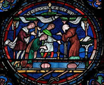 Thomas Beckett, an Archbishop of Canterbury created numerous, gorgeous stained glass windows in the cathedral. He is venerated as a saint and martyr. He was assassinated by followers of the King of England.