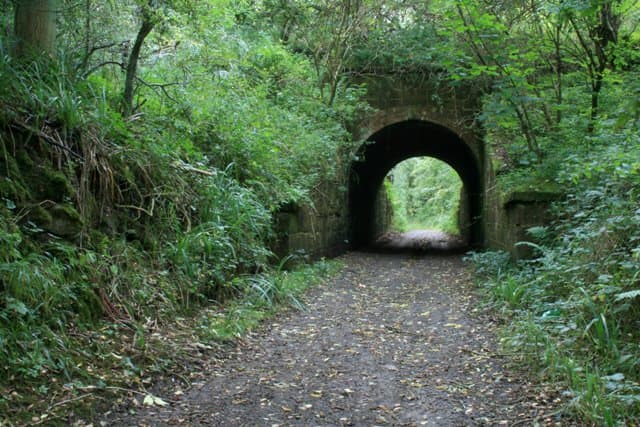 The tramway - now footpath - leads beyond the old carter's bridge past the remains of Quarry Siding and Guibal Fan house, aka 'SS Castle' above Wilton village to the Guisborough-Wilton road