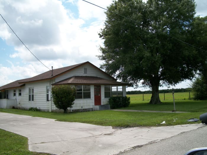 Hattie May's place. The current owner has several black and tan hounds that set up a noisy objection to our presence and chased us down the road, in full voice.