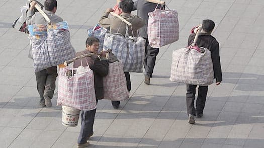 China has 225 million rural born migrant workers in the cities.Living in crowded dormitories, they and their children are not entitled to health care, education or pensions in the city because their "hukou"(residence registration) is elsewhere.