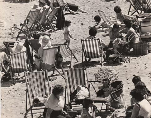 Redcar Beach 'under siege', deckchairs as far as the eye can see, Candy Floss vendors, tea stalls, ice cream sellers, donkey rides along the tide line, Punch & Judy shows (at least two) and people tramping up and down looking for family or friends