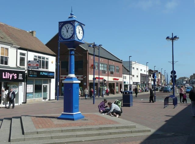 This modified version stands some way along the pedestrianised section of the High Street