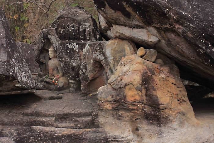 A carved Buddha icon dates from a later period during which Phu Phrabat took on considerable religious significance