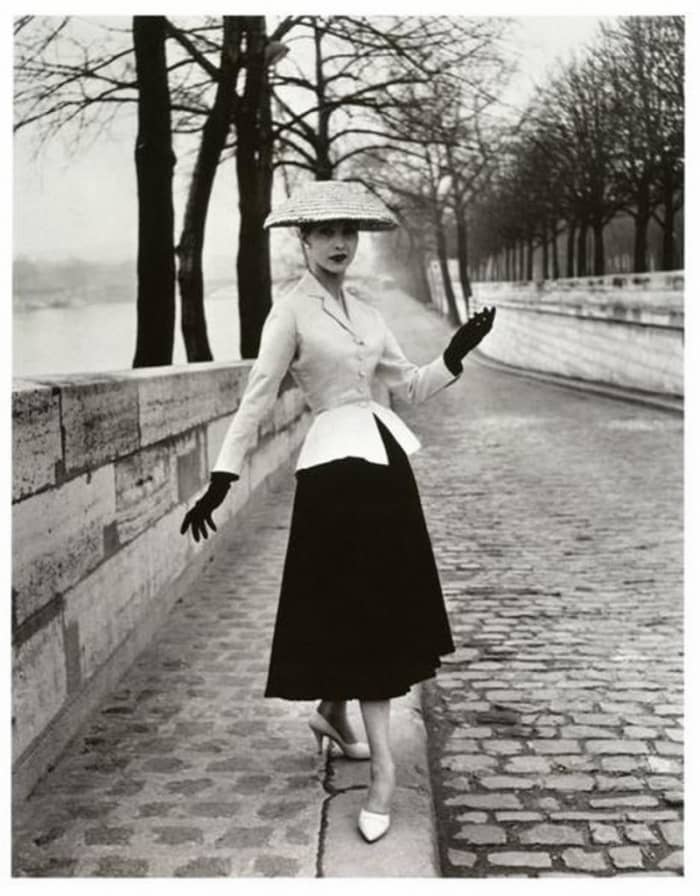 Christian Dior's 1947 New Look signaled out with the inverted triangle and in with the hourglass. Women wore corsets, girdles and petticoats to get the look.