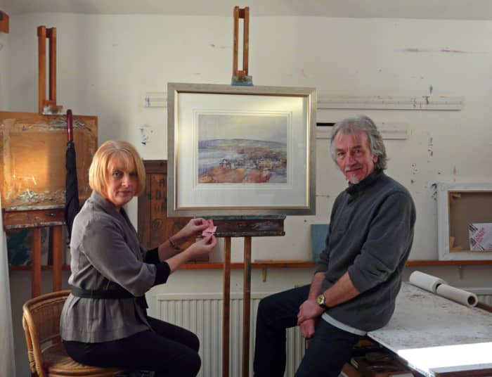 The artist Tom Harland, creator of the 4mm scale 'Bramblewick' layout is seen here with Julie Abrahams,