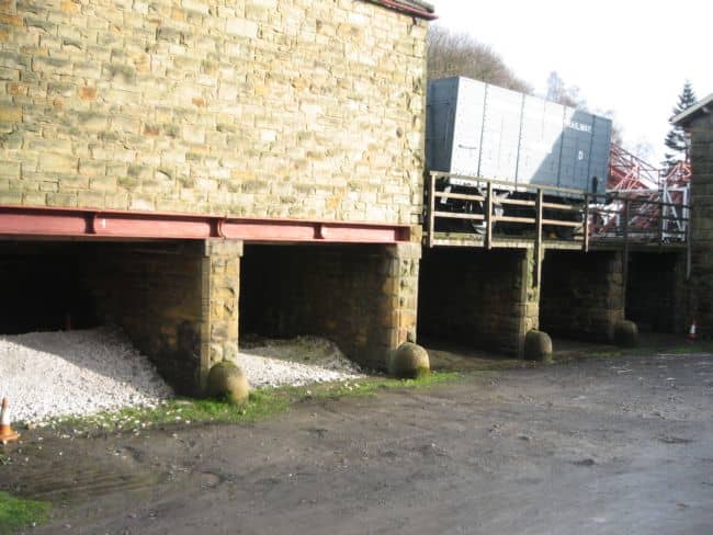 Coal drops and Lime Cells at Goathland Station on the NYMR - lime cells were enclosed to prevent lime dust from getting into passengers' eyes and lungs. These NER hopper wagons came in around the late 1890s
