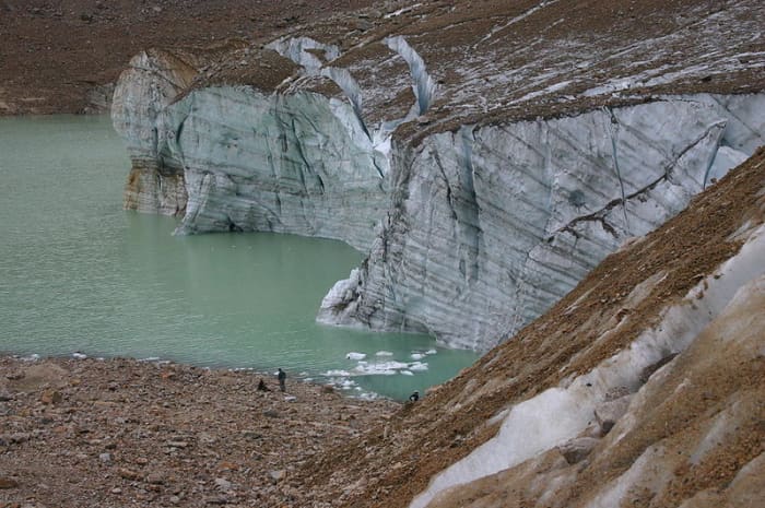 Each summer, gravel is deposited on top of the Cavell Glacier. Each streak along this glacier represents one year.