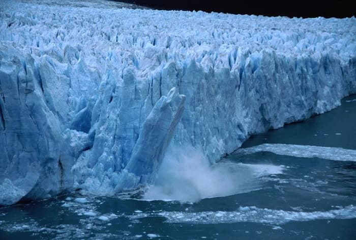 A chunk of ice falls from the Perito Moreno Glacier in Argentina.