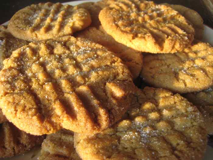 Soft and chewy yet crisp around the edges, these are the perfect peanut butter cookies. A dusting of sugar adds an extra bit of sweetness and texture, and helps keep them from sticking to the cookie sheet.