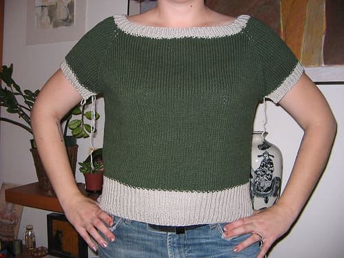 Far too wide, and much too short. Bad, bad, bad. I knit this same garment three times before giving up, rewinding the yarn, and making a tank top instead. It was too big and I gave it away. Do a gauge swatch!