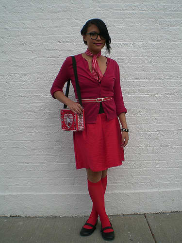 Accessories: Lunch box bag, knee-high socks, Mary Jane shoes, skinny belt, patterned scarf, black bangle, and thick-framed