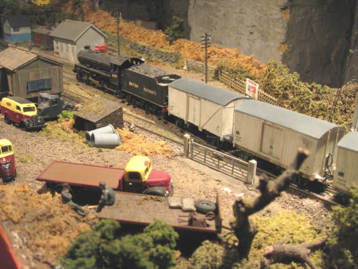 Unnamed class B1 4-6-0 61339 passes Ayton Row Station (closed to passengers) with a short train of fish vans, several ex-LNER wooden-bodied, as many BR-built steel-bodied. Viewed at the 'occupation crossing' with the goods depot in the foreground