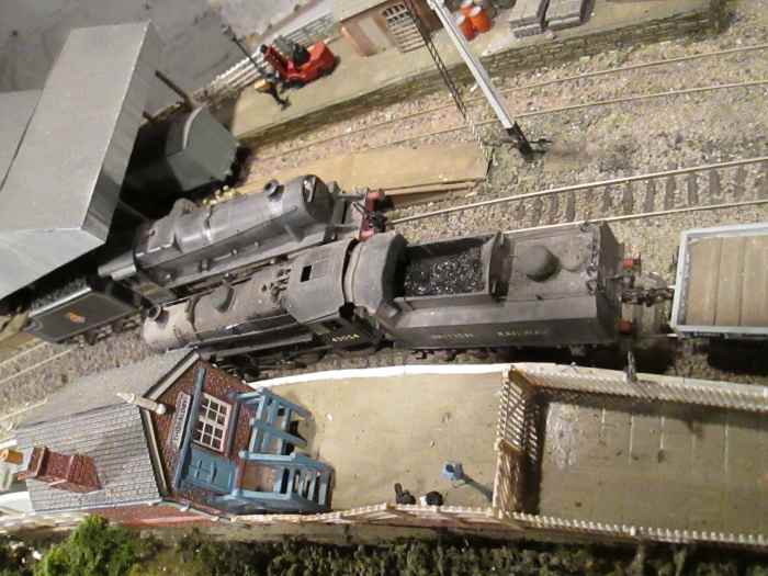 Ex-LMS classes cross at Thoraldby. 'Black 5' 4-6-0 runs up light engine with 4MT 2-6-0 'Flying Pig' returning empty freight stock